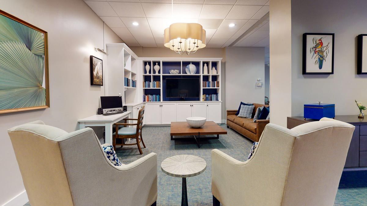 A modern living room with elegant furniture and stylish decor.