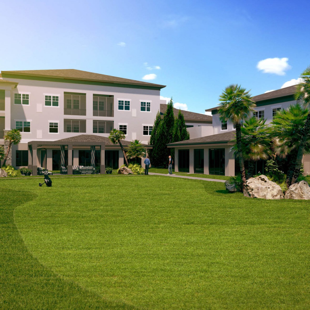 A modern building surrounded by a well-maintained lawn and lush greenery under a clear blue sky.