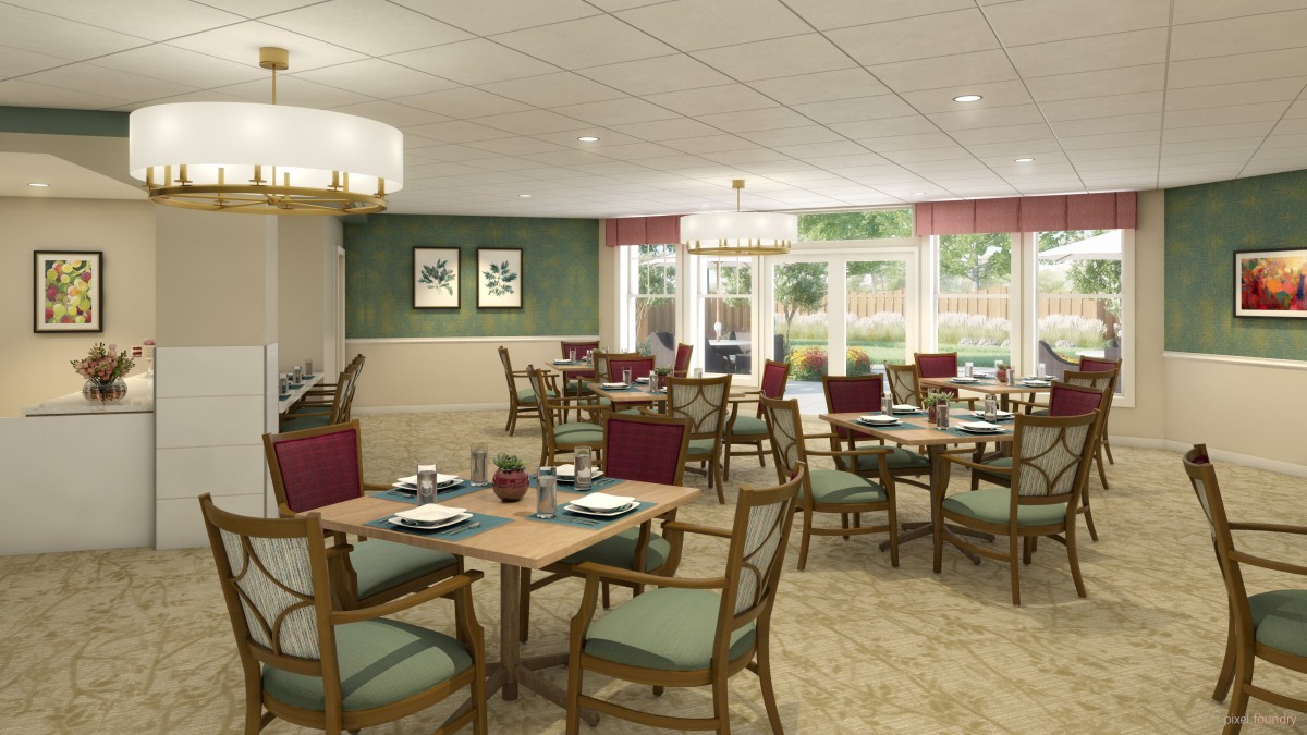 A cozy and elegantly decorated dining room with multiple tables and chairs, ready for guests.