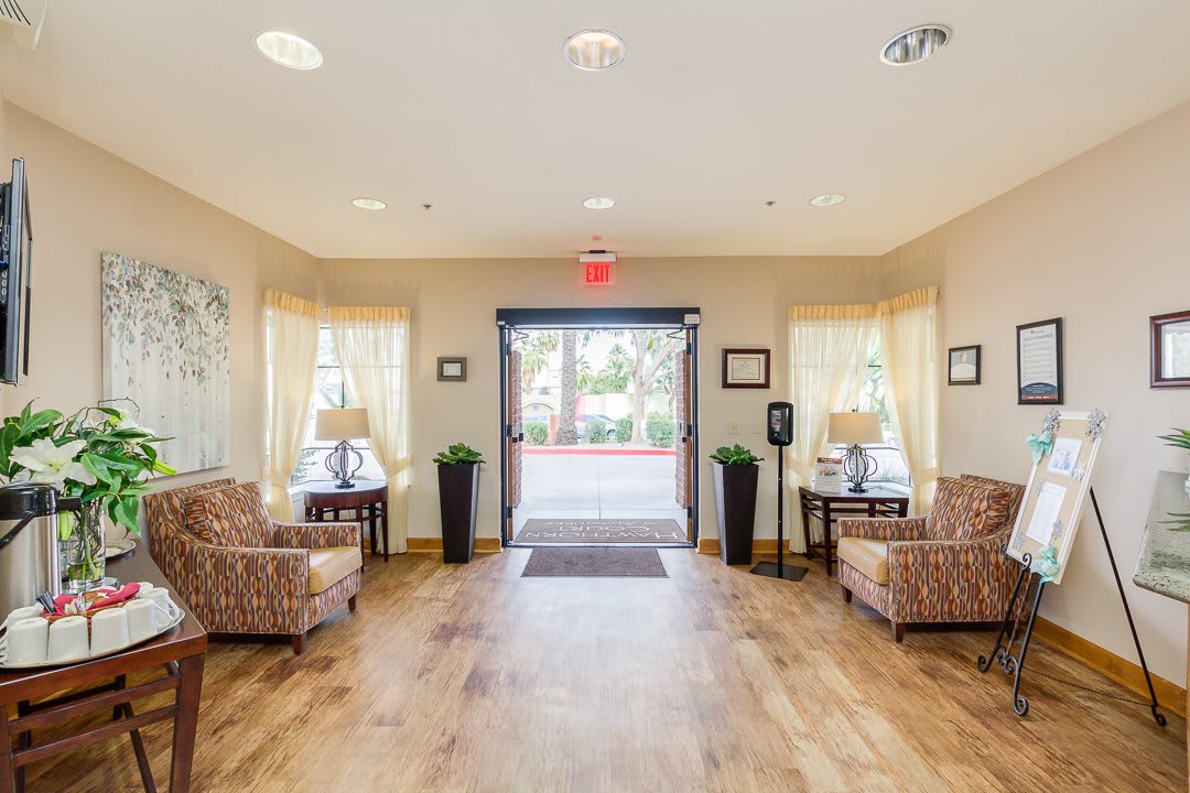 A welcoming lobby with comfortable seating and warm lighting.