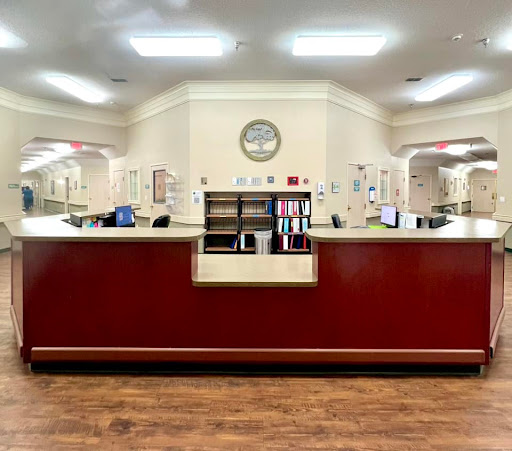 A spacious reception area with a large desk and welcoming environment.