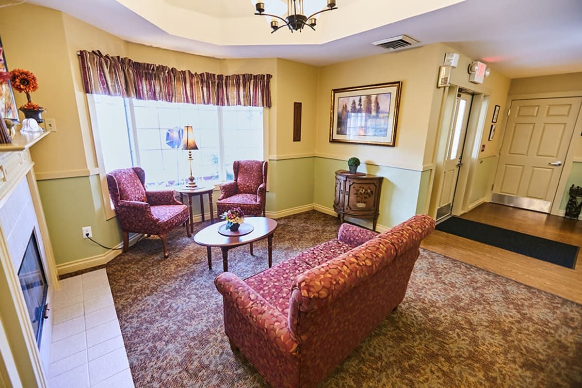 A cozy living room with comfortable seating and warm decor.