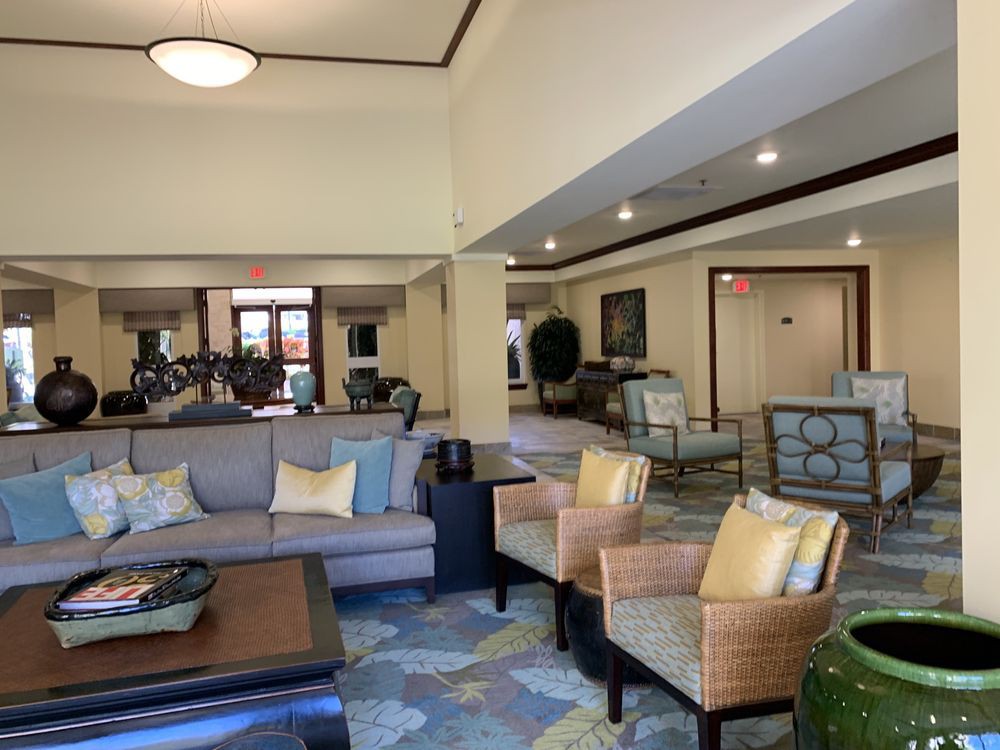 A modern lobby interior featuring comfortable seating and stylish decor.