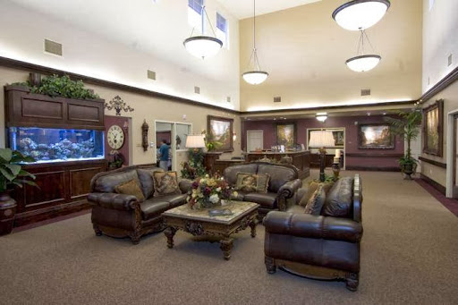 A spacious and inviting living room area with comfortable seating and elegant decor.