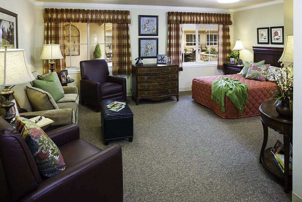 A cozy living room with elegant furnishings and warm decor.