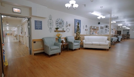 A cozy living space featuring light-colored furniture and decorative elements.