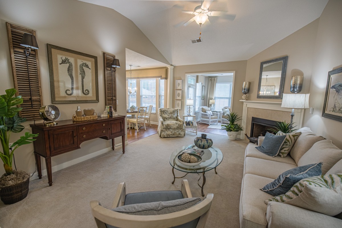 A cozy living room with elegant furniture and soft lighting.