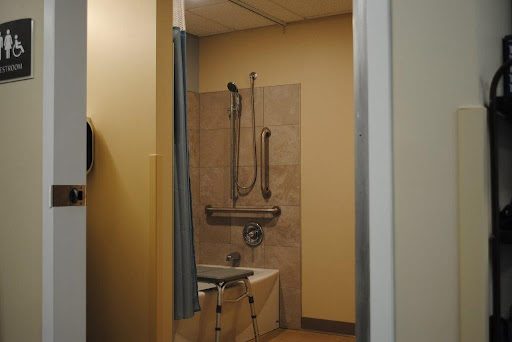 An accessible shower area in a medical facility.