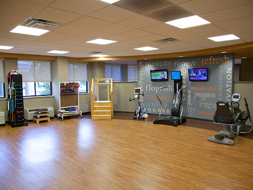 A well-equipped fitness center designed for rehabilitation and exercise.