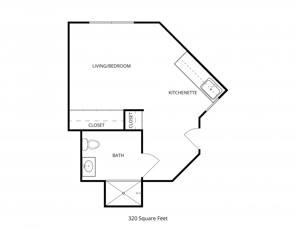 Floor plan of a studio apartment layout with kitchen, living area, bathroom, and closet.