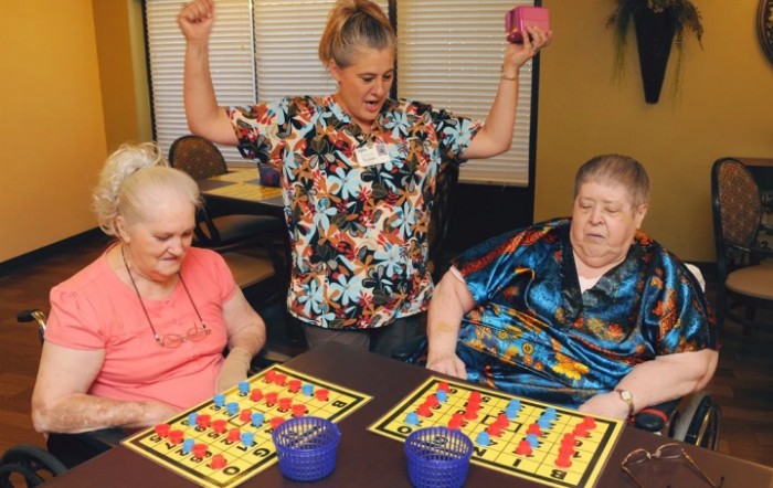 Seniors enjoying a lively game of bingo at a care facility.