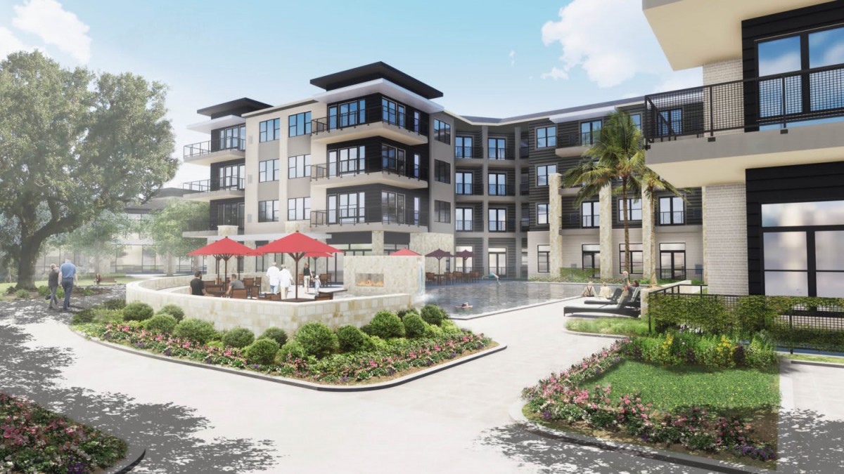 A modern apartment complex featuring landscaped gardens and outdoor seating areas.