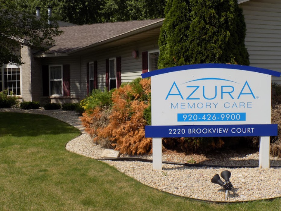 An image of Azura Memory Care building with a prominently displayed sign and well-maintained landscaping.