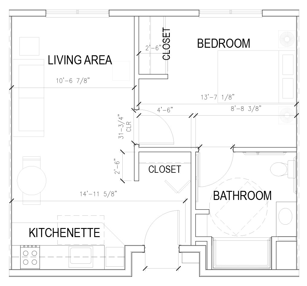 A floor plan depicting a small apartment with a living area, bedroom, bathroom, kitchenette, and closets.