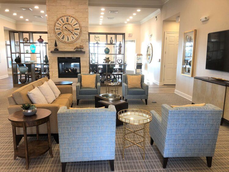 A modern living room with comfortable seating and stylish decor.