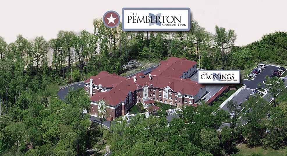 Aerial view of a residential building with a red roof surrounded by trees, labeled as 'The Pemberton' and 'Choo Choo'.