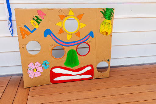 A vibrant and playful homemade game board featuring cheerful designs, ideal for children's activities.