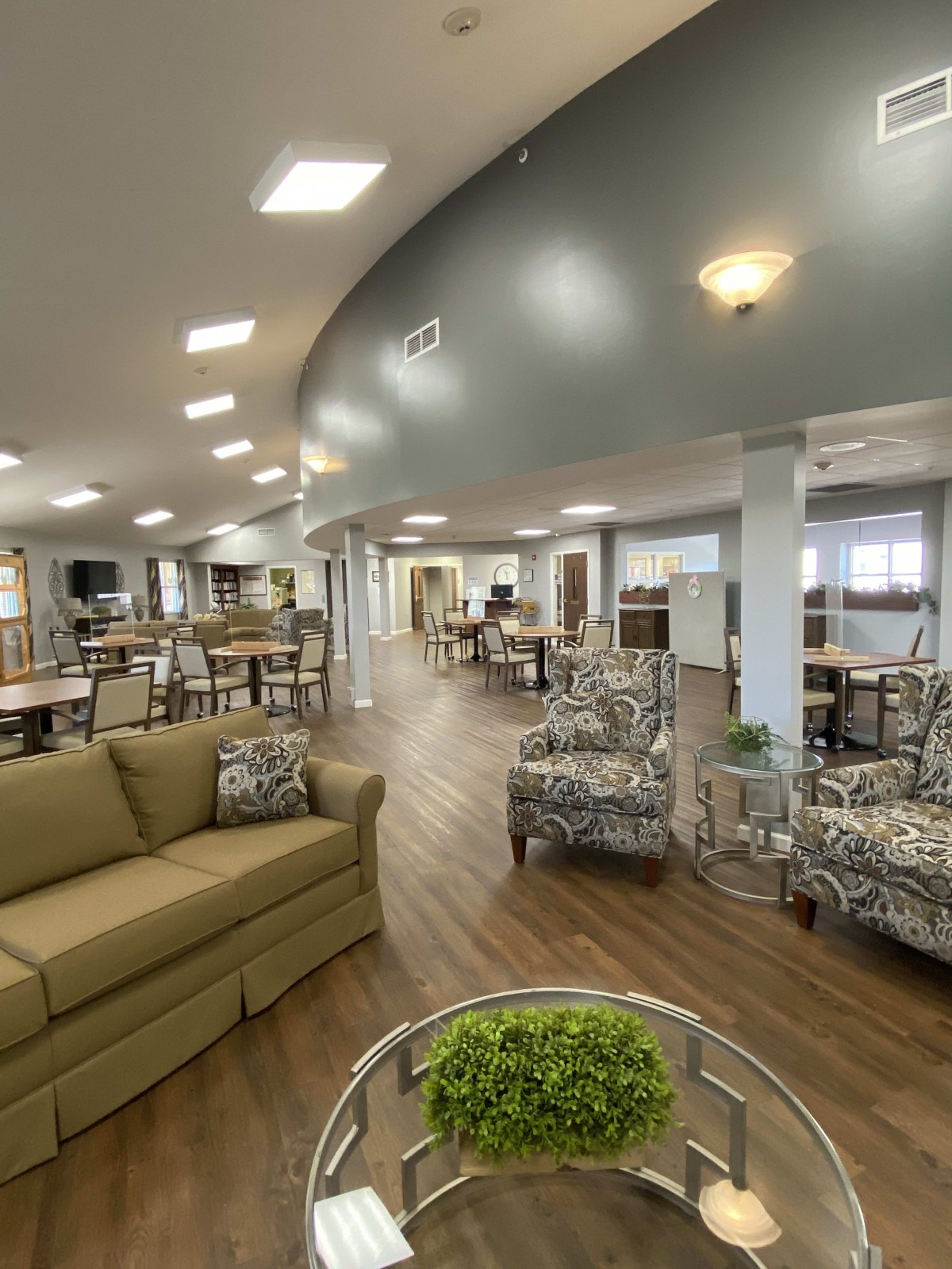 A modern and spacious lounge area with comfortable seating and stylish decor.