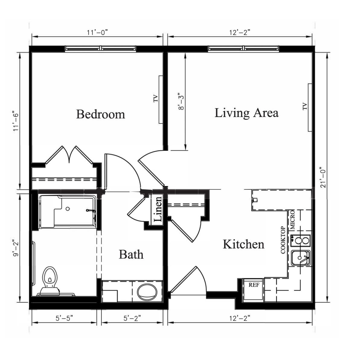A floor plan depicting the layout of a one-bedroom apartment with a kitchen, living area, and bathroom.