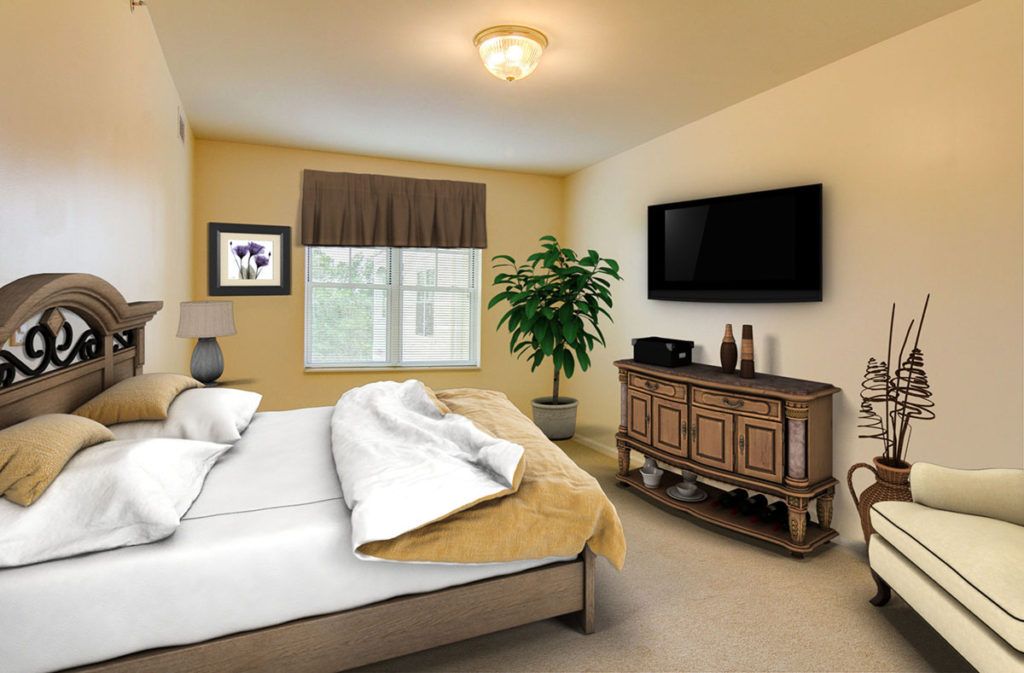A modern bedroom with elegant furnishings, featuring a neatly made bed, a flat-screen TV mounted on the wall, and a large potted plant by the window.
