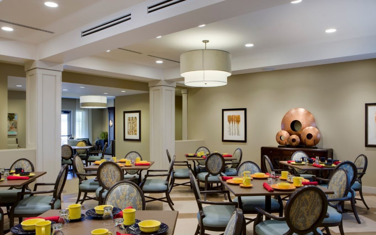A modern dining room with elegantly set tables and stylish decor.