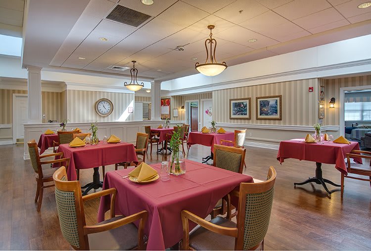 A well-decorated dining area with tables set for service.