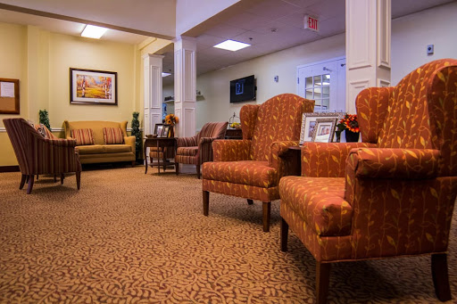 A cozy lobby area featuring comfortable seating and a warm, inviting atmosphere.