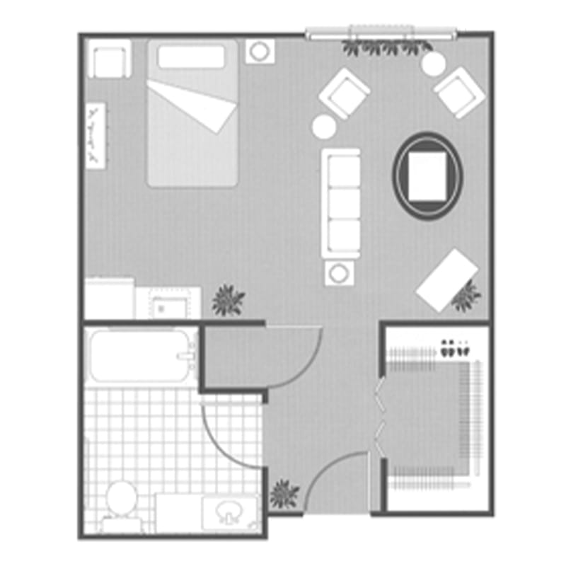 A floor plan of a one-bedroom apartment with a living room, bathroom, and kitchen.