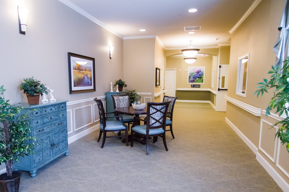 A cozy hallway with elegant furniture and decor.