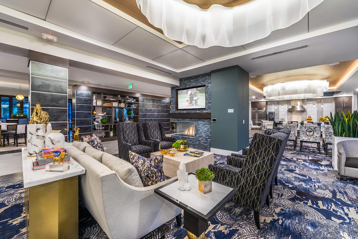 A modern and luxurious lounge area with comfortable seating and stylish decor.
