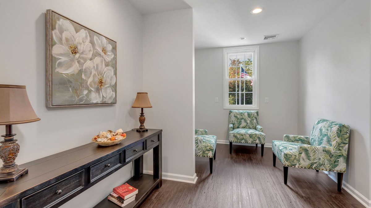 A cozy living space with elegant decor and comfortable seating.