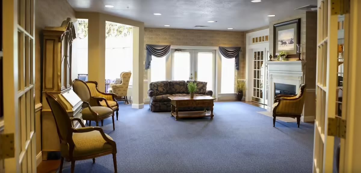 A cozy living room with elegant furniture and natural lighting.