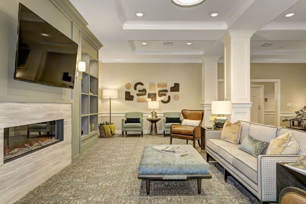 A modern living room with comfortable seating and stylish decor.