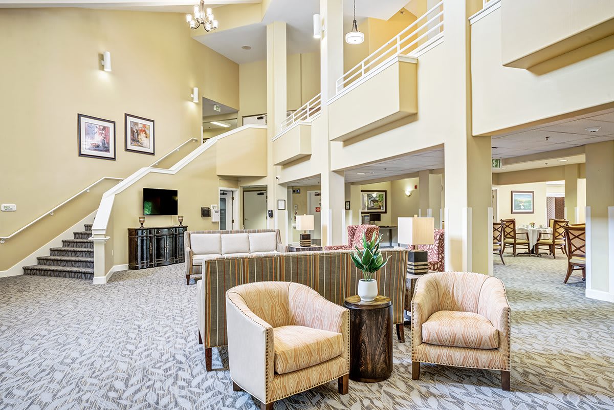 A modern and spacious lobby area with comfortable seating and elegant decor.