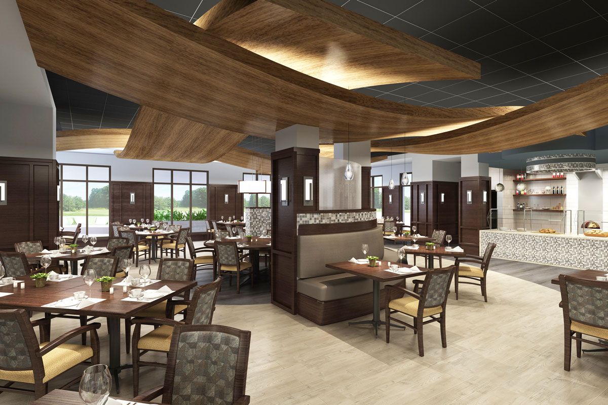 A modern restaurant interior with neatly arranged tables and chairs.