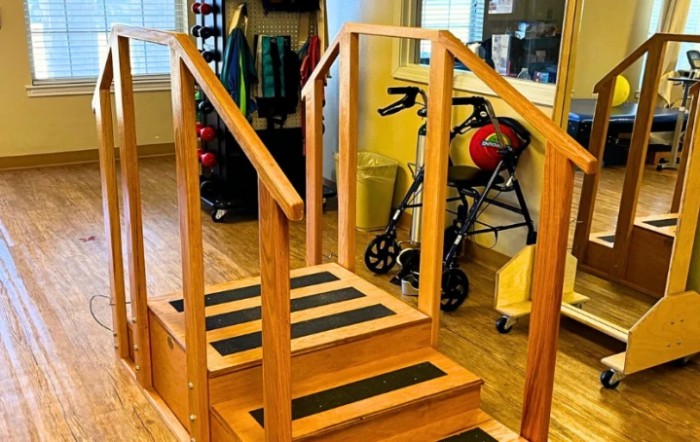 Indoor rehabilitation stairs used for physical therapy exercises.