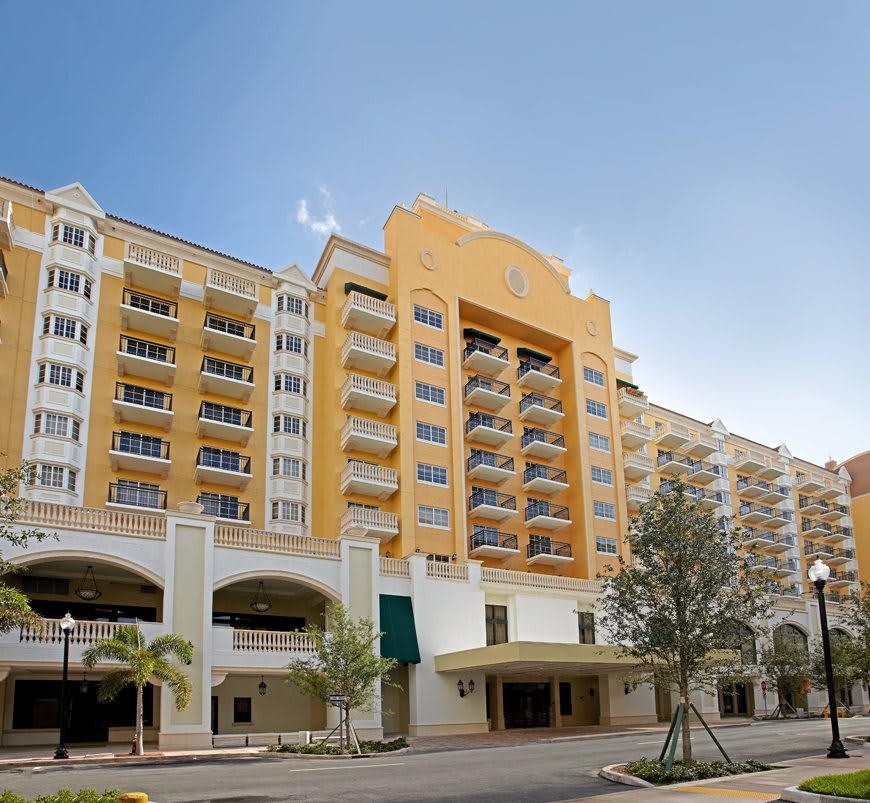 An urban hotel building with multiple floors and a modern design.