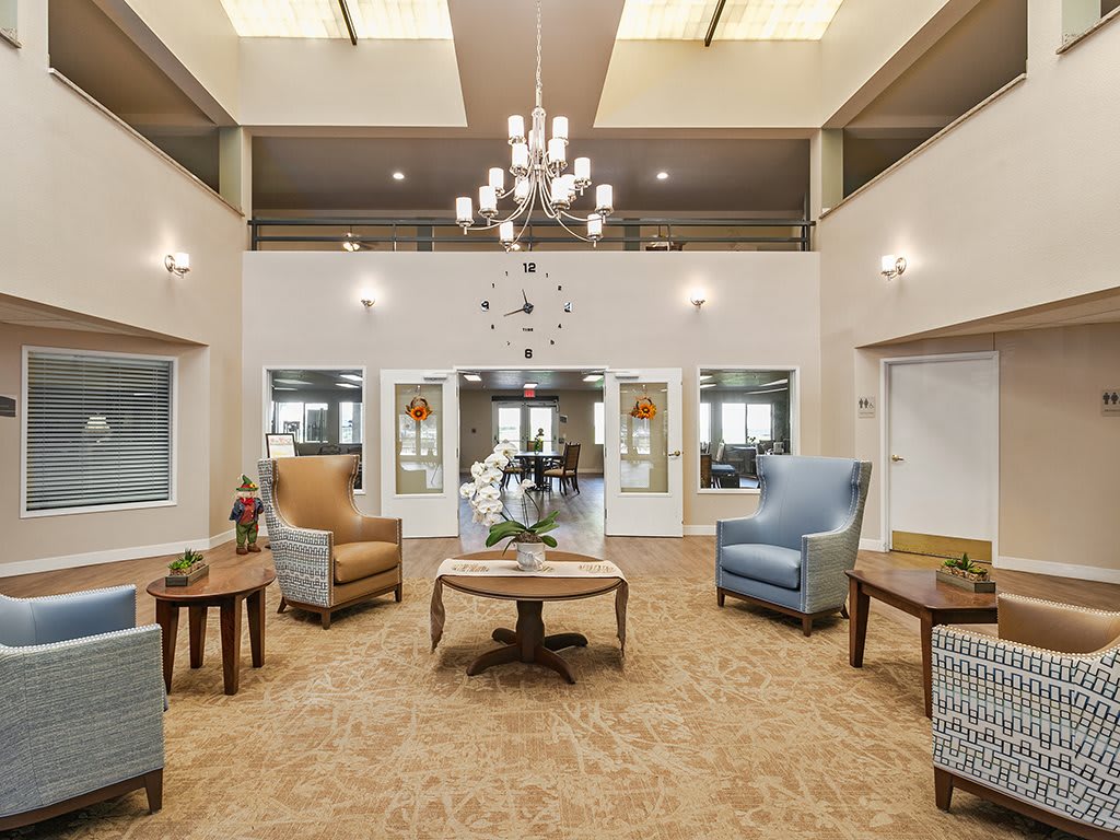 A spacious lobby area with comfortable seating and elegant lighting.