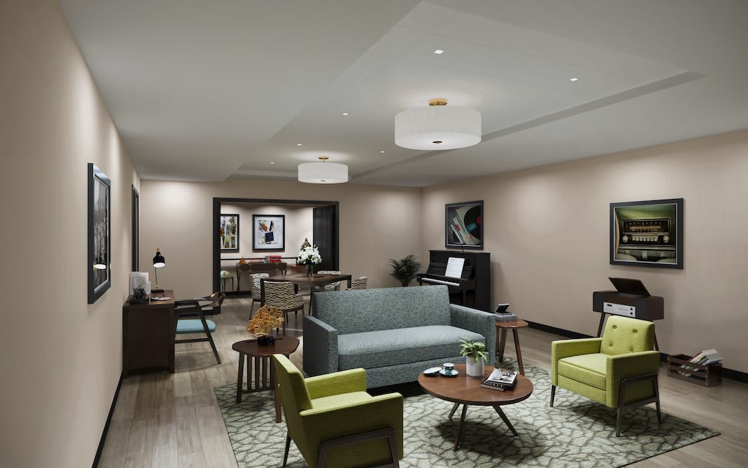 A modern living room with stylish furniture and warm lighting.