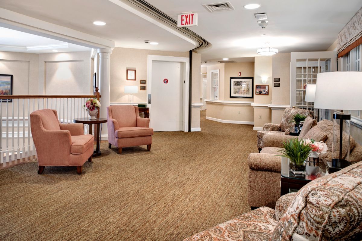 A cozy lobby area with seating and decor.