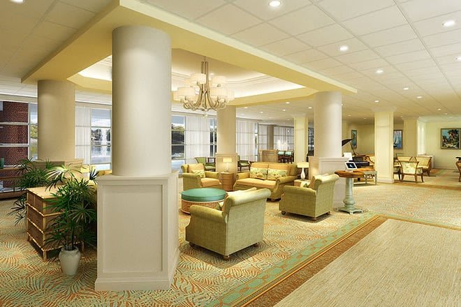 A comfortable and well-lit lobby area with plush seating arrangements.