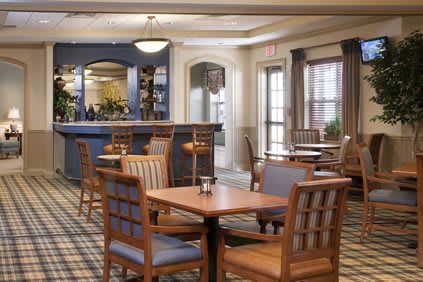 A cozy dining area with wooden furniture and a calm ambiance.