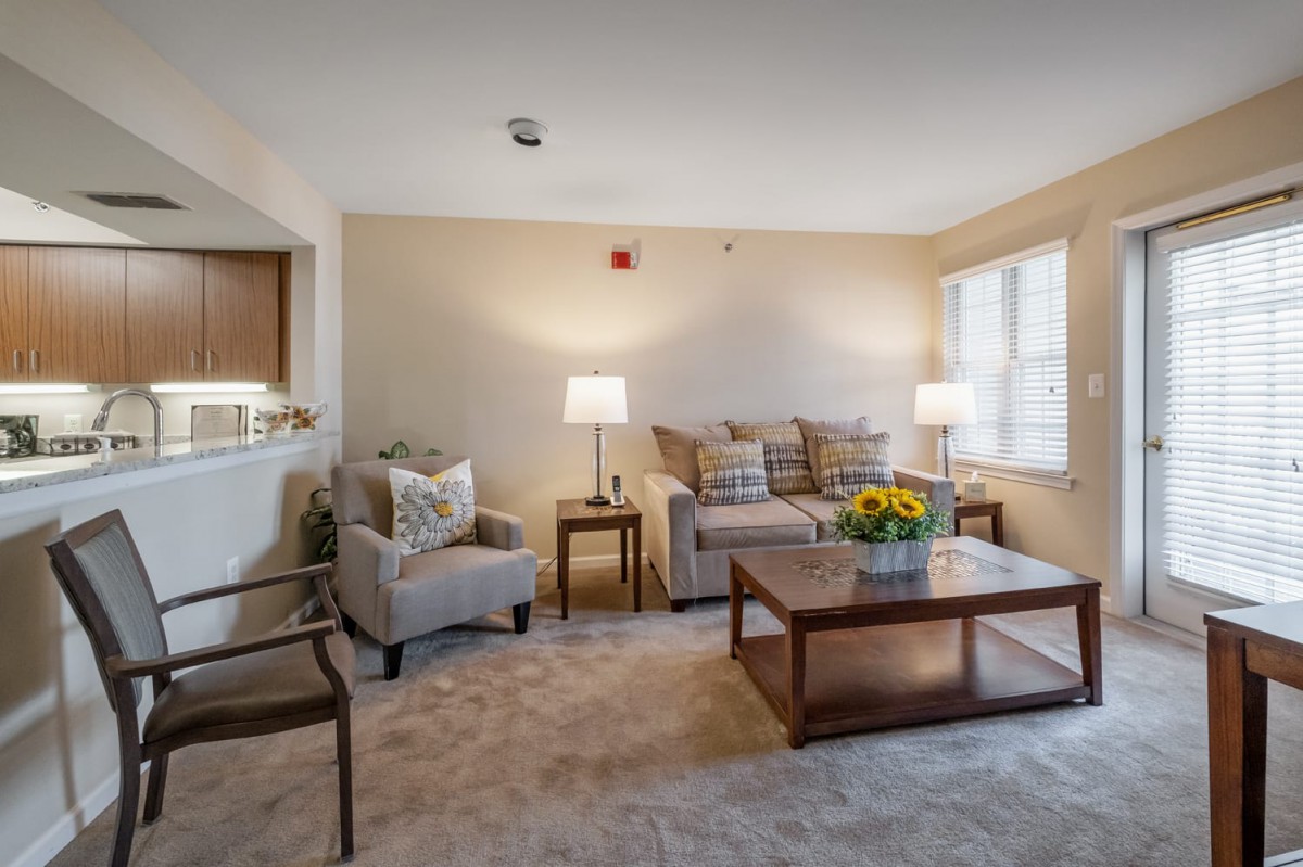 A cozy living room with comfortable seating and modern decor.