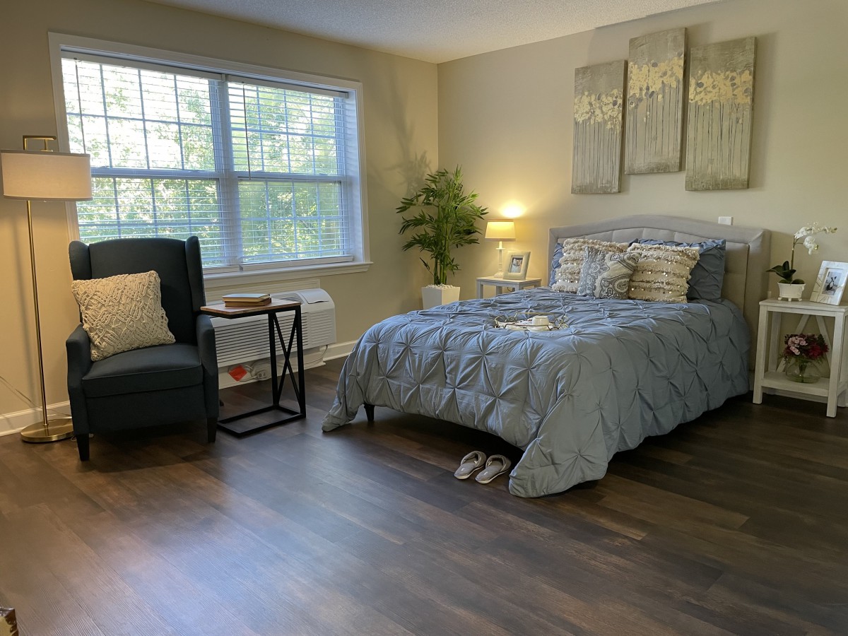 A cozy and modern bedroom with stylish decor and comfortable furnishings.