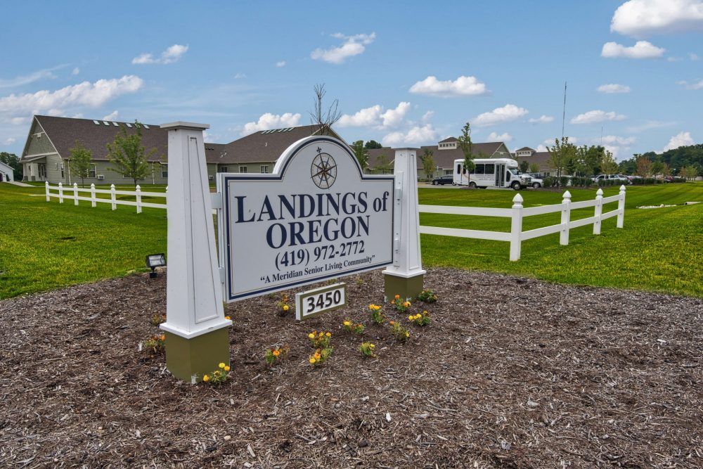 Entrance sign for the Landings of Oregon residential community.