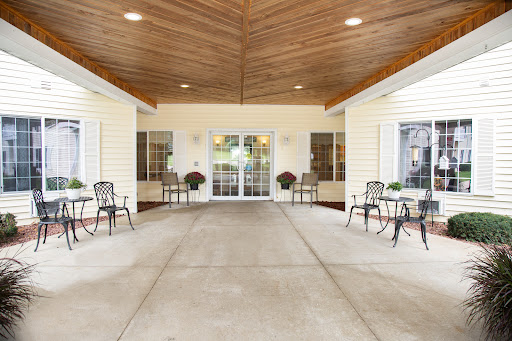 A welcoming entrance with seating arrangements, designed for a comfortable community atmosphere.