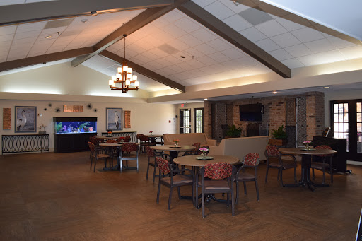 A cozy dining and lounge area featuring comfortable seating and a welcoming atmosphere.