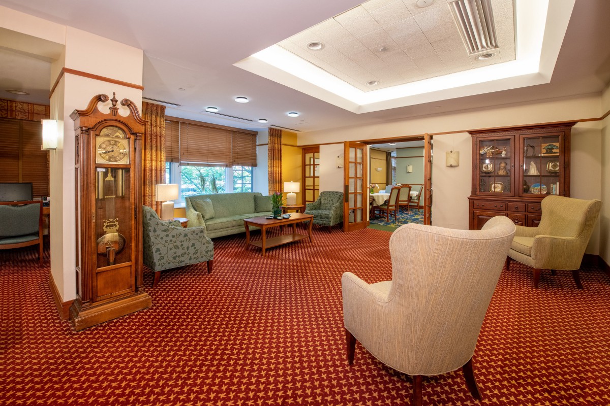 A cozy living room with comfortable seating and classic decor.