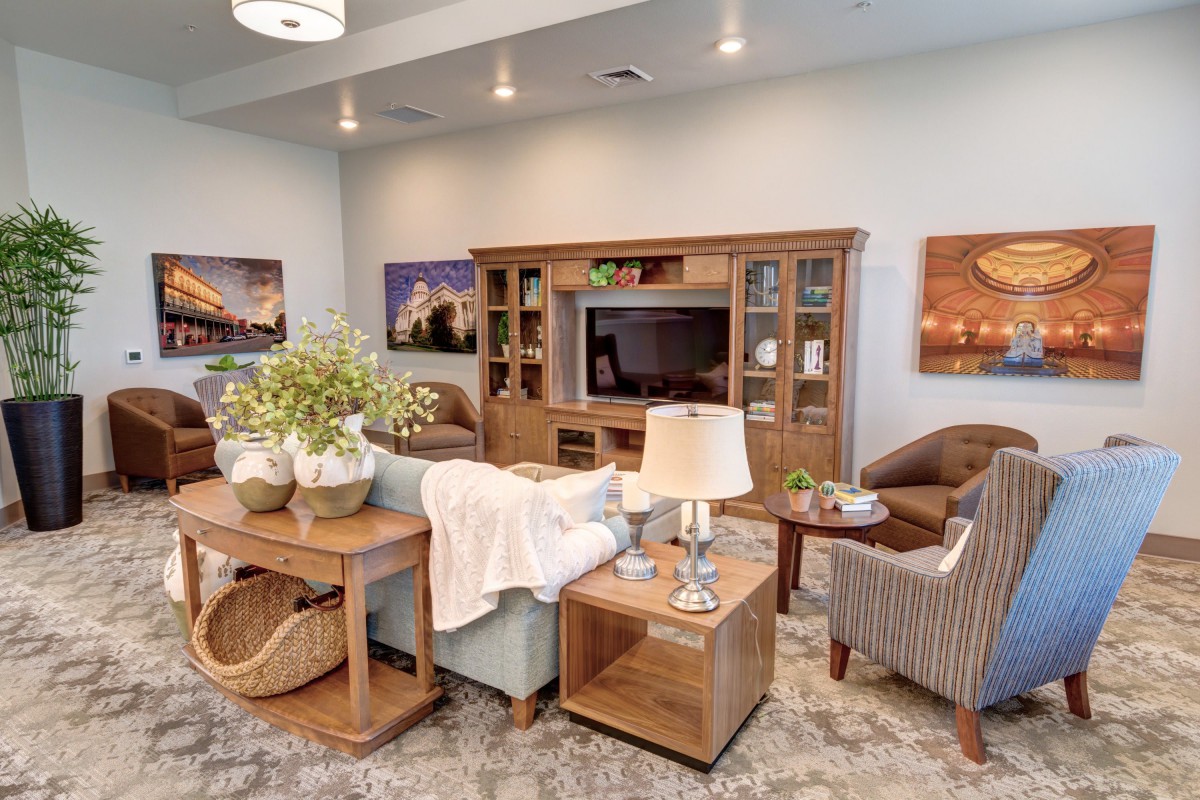A cozy living room with wooden furniture and elegant decor.