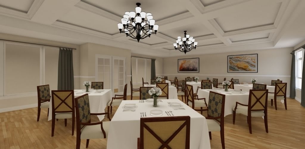 An elegant restaurant dining room with white tablecloths and stylish chandeliers.